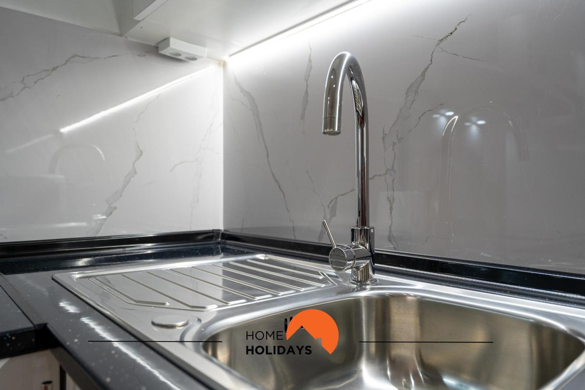 #212 Magna 106b By Holidays Apartment *